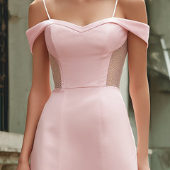 Elegant pink off-the-shoulder maxi dress by Christine Brewer, featuring flowing fabric and a stylish design for wedding guests.