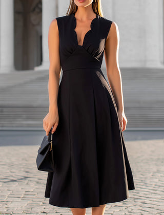 Black scalloped edge V-neck sleeveless fit-and-flare midi dress by Christine Brewer, shown with flared skirt and scalloped neckline.