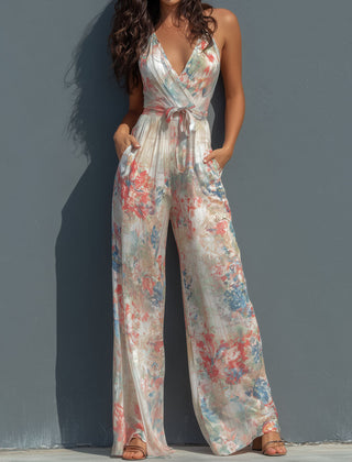 White floral satin halter neck jumpsuit with wrap front and wide-leg pants for women, by Christine Brewer.