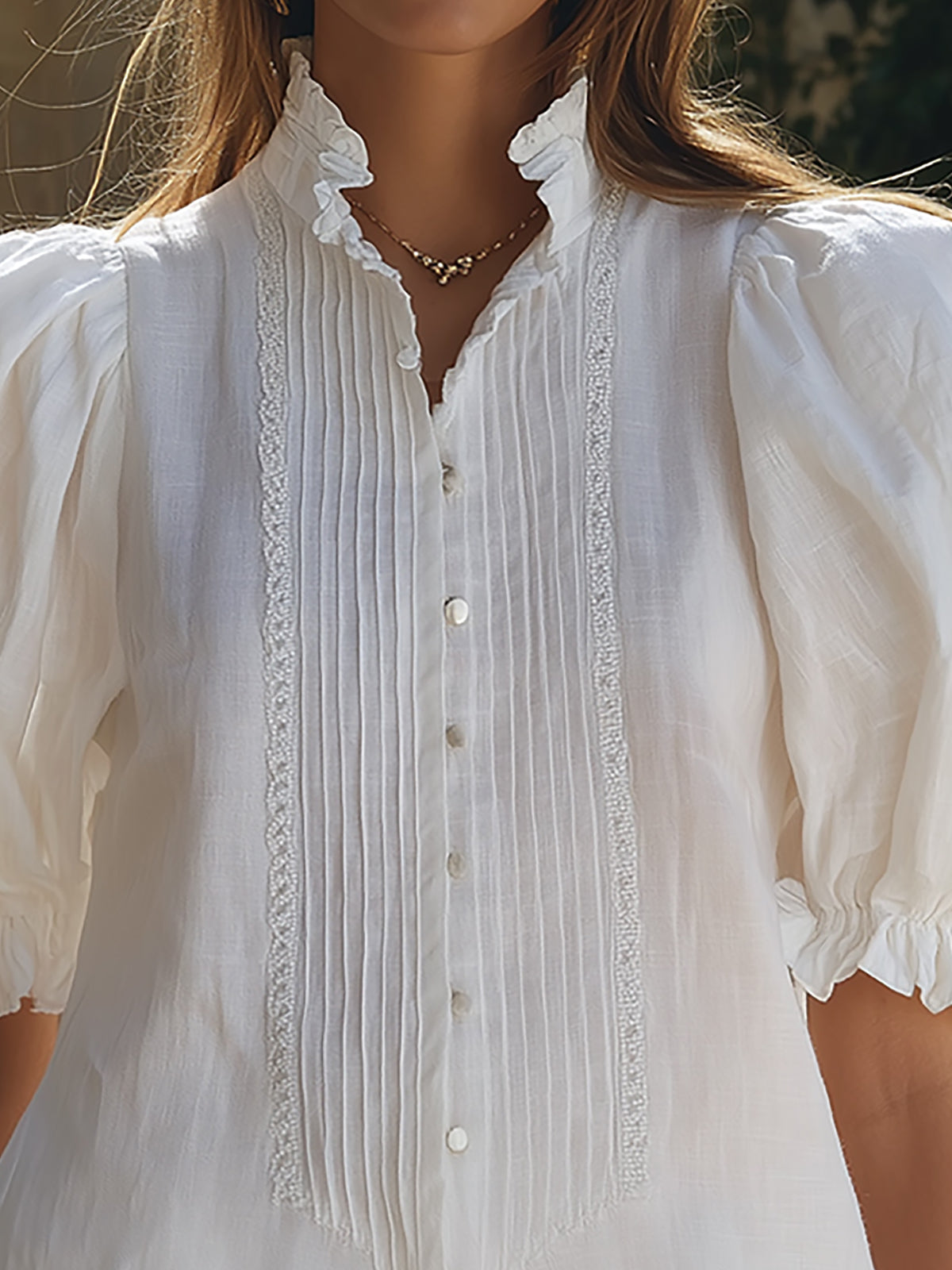 White linen puff sleeve two-piece co-ord set for women featuring stylish pants, designed by Christine Brewer.