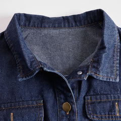 Dark blue denim sleeveless balloon jumpsuit with multiple pockets, designed for women by Christine Brewer.