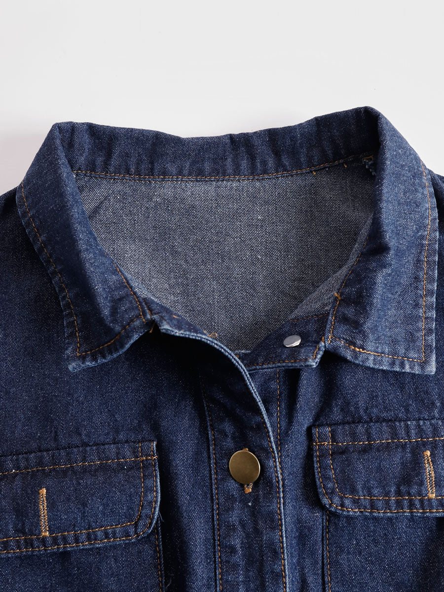 Dark blue denim sleeveless balloon jumpsuit with multiple pockets, designed for women by Christine Brewer.