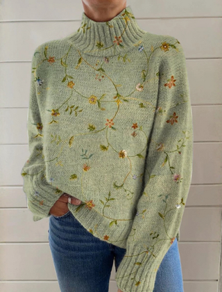 Women’s ribbed sweater named Ellie by Christine Brewer, featuring a fitted design and textured knit fabric.