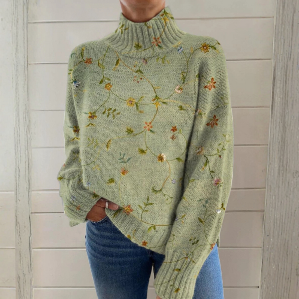 Women’s ribbed sweater named Ellie by Christine Brewer, featuring a fitted design and textured knit fabric.