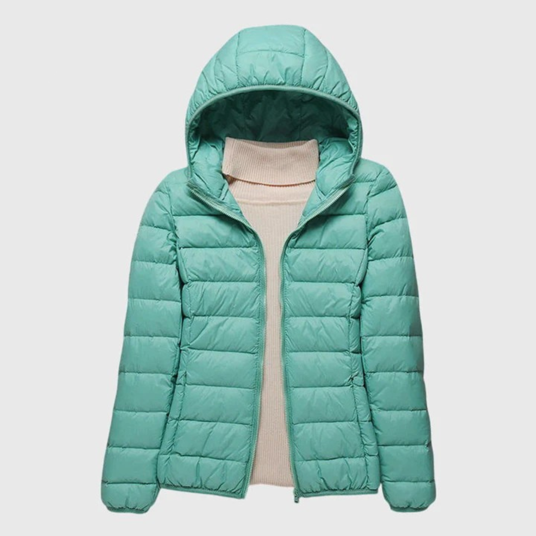 Christine Brewer Lily ultra-light quilted jacket with a sleek design and padded stitching, perfect for lightweight warmth and style.