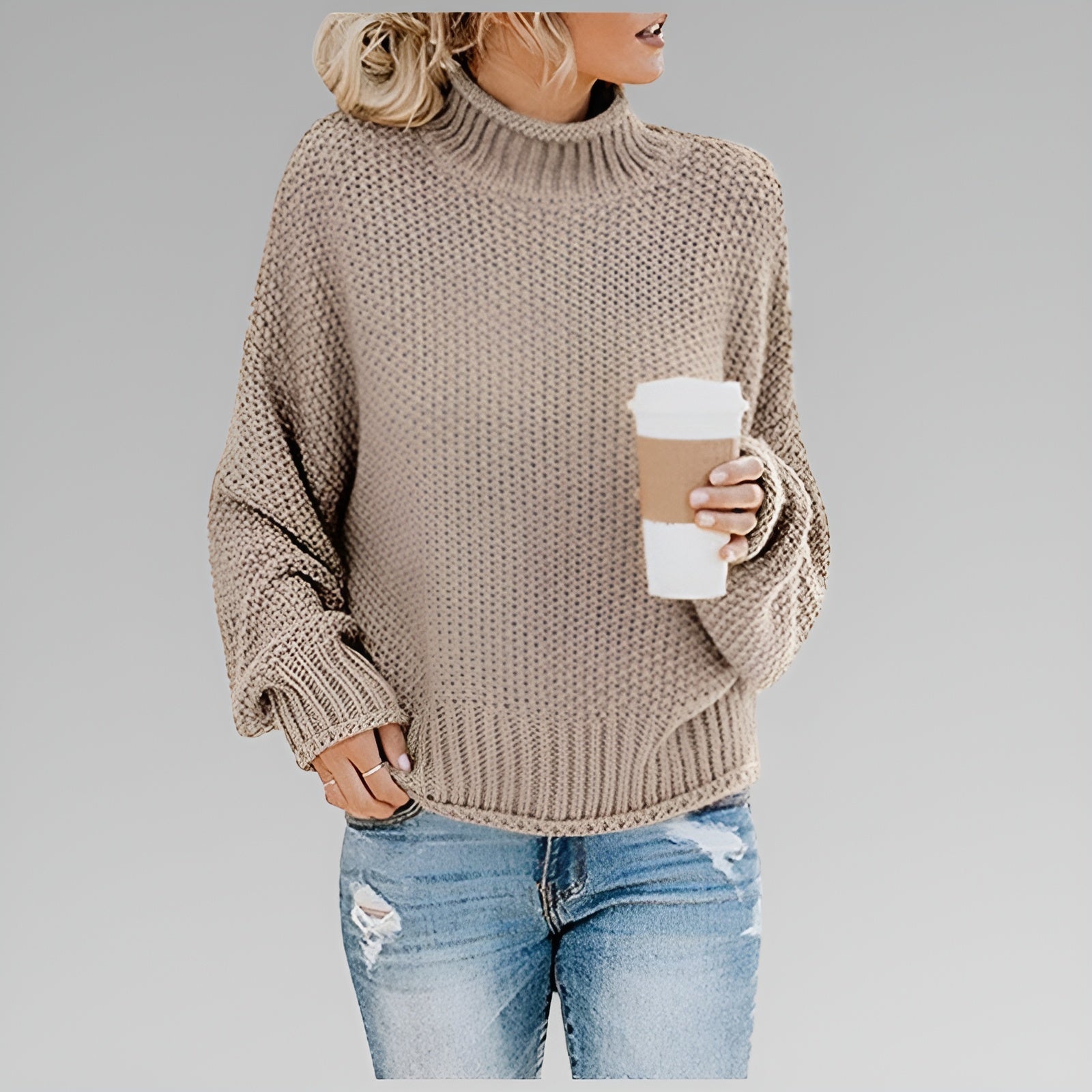 Amy Winifred ribbed orange sweater for women by Christine Brewer, showing the close-up of the textured knit fabric.