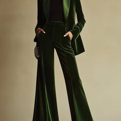 Emerald green loose velvet two-piece suit set for women with pants, by Christine Brewer, shown on a model.