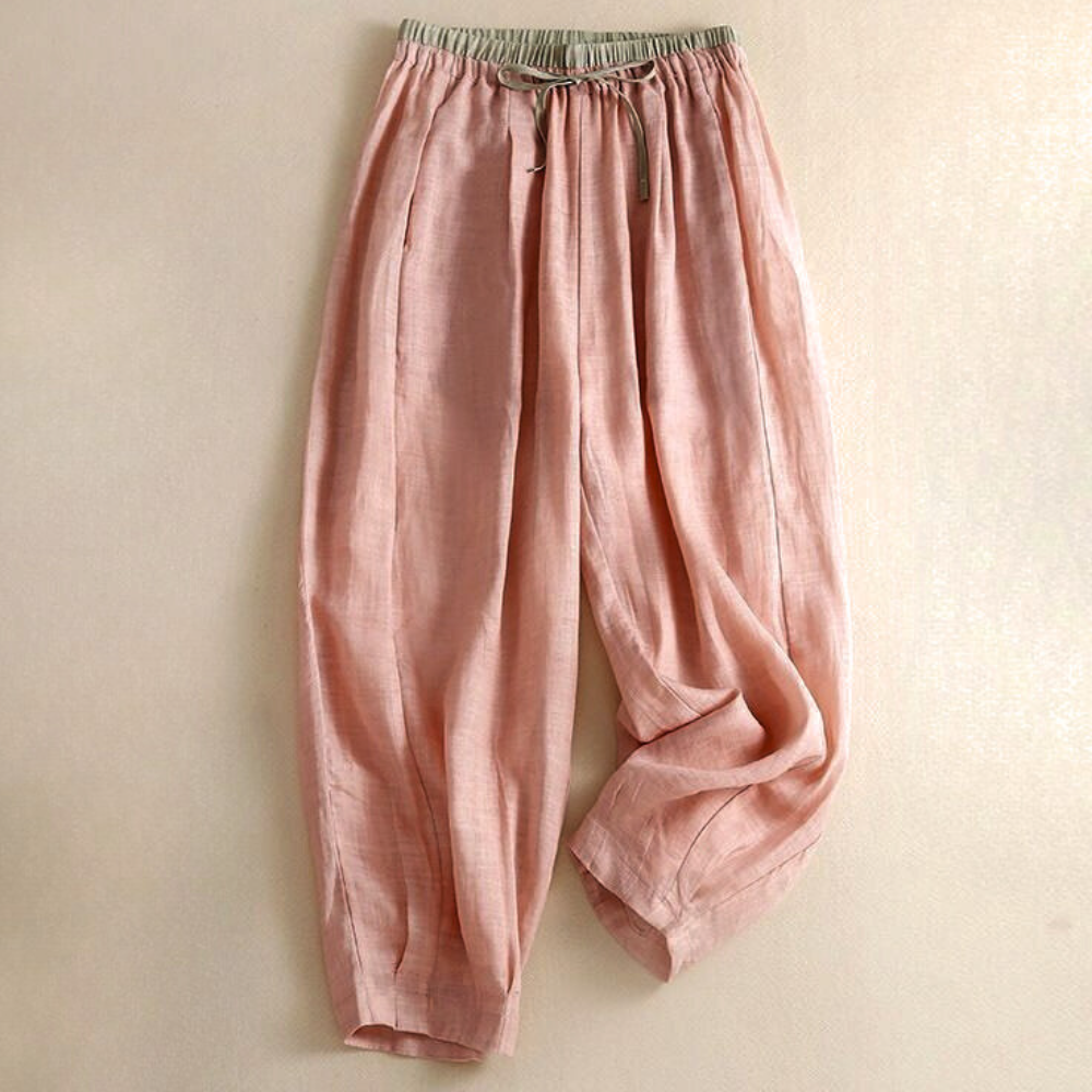 Women’s tapered linen trousers by Christine Brewer, loose pull-on pants with a relaxed fit and comfortable style.