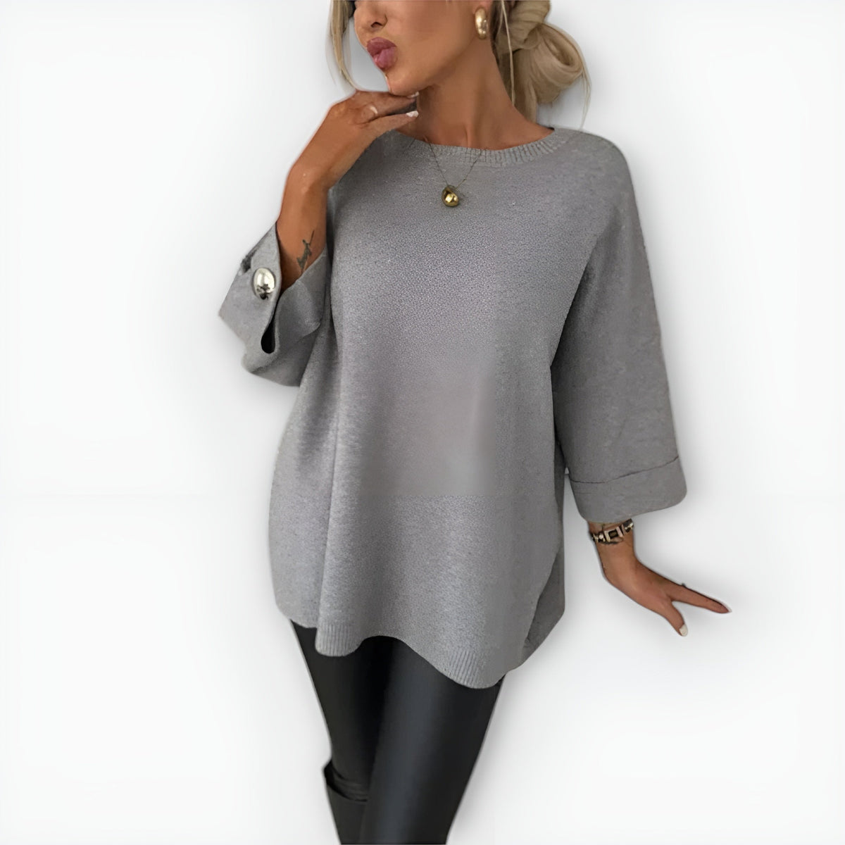 Noelle knit sweater for women by Christine Brewer, featuring a cozy, textured knit fabric and a stylish, relaxed fit.