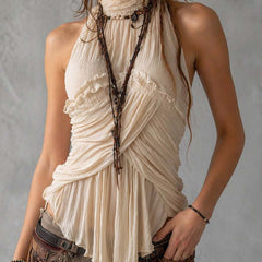 Ivory pleated halter neck chiffon sleeveless blouse for women by Christine Brewer, featuring elegant pleats and a flowy design.