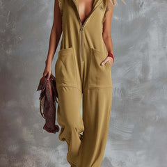 Raspberry red cotton hooded zip-front jumpsuit for women, featuring a relaxed fit and stylish design by Christine Brewer.