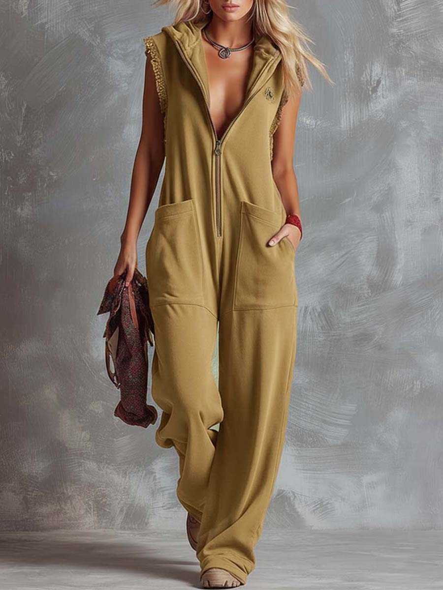 Raspberry red cotton hooded zip-front jumpsuit for women, featuring a relaxed fit and stylish design by Christine Brewer.