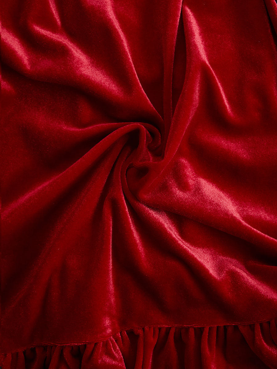 Red velvet pleated ruffled long sleeve blouse by Christine Brewer, featuring elegant design and textured fabric.