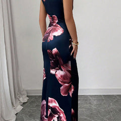 White bodycon sleeveless maxi dress by Christine Brewer with contrast color flower print and round neckline, perfect for summer.