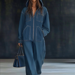 Women's casual loose retro denim jumpsuit with hood, long sleeves, zipper front, and pockets by Christine Brewer.