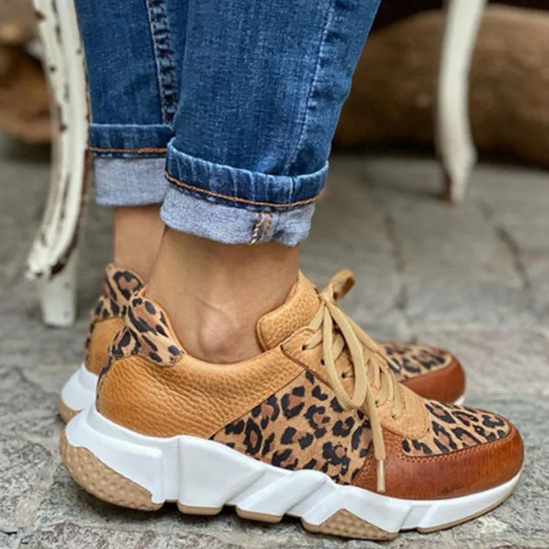 Christine Brewer women's leopard sneakers with thick soles, lace-up design, orthopedic comfort, casual walking shoes with stitching details.