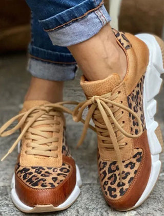 Christine Brewer leopard-pattern women's orthopedic sneakers with thick soles, lace-up design, and casual, comfortable walking style.
