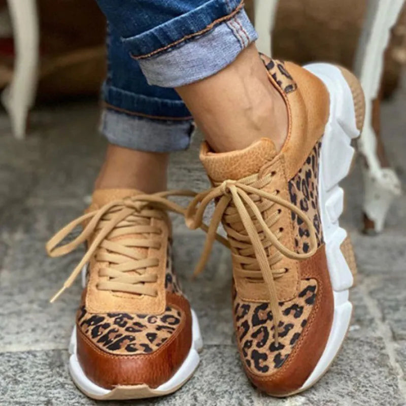 Christine Brewer leopard-pattern women's orthopedic sneakers with thick soles, lace-up design, and casual, comfortable walking style.