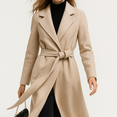 Elegant Olivia long belted wool coat for women by Christine Brewer, shown in a stylish display with a classic silhouette and belt detail.