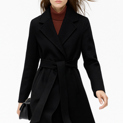 Elegant wool coat for women by Christine Brewer, featuring a long belted design and sophisticated style.