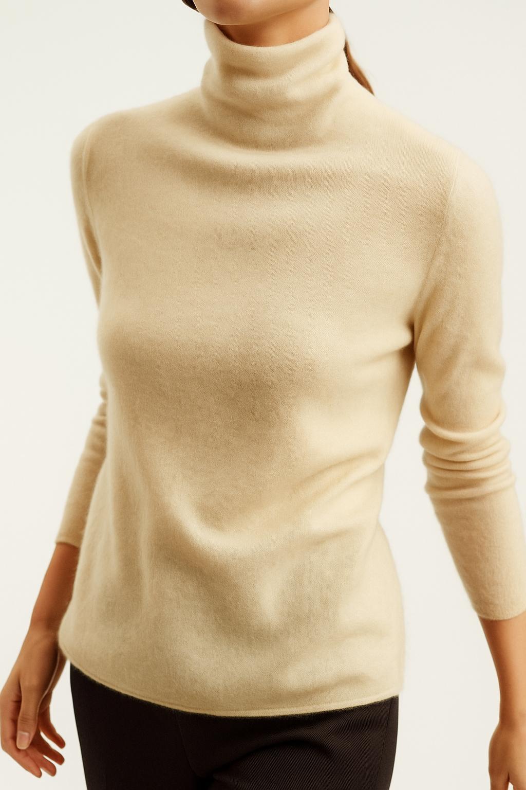 Elegant cashmere turtleneck sweater for women by Christine Brewer, featuring a classic fit and soft, luxurious fabric.