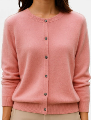 Pink cashmere Stella button-front sweater for women by Christine Brewer, shown draped on a mannequin.