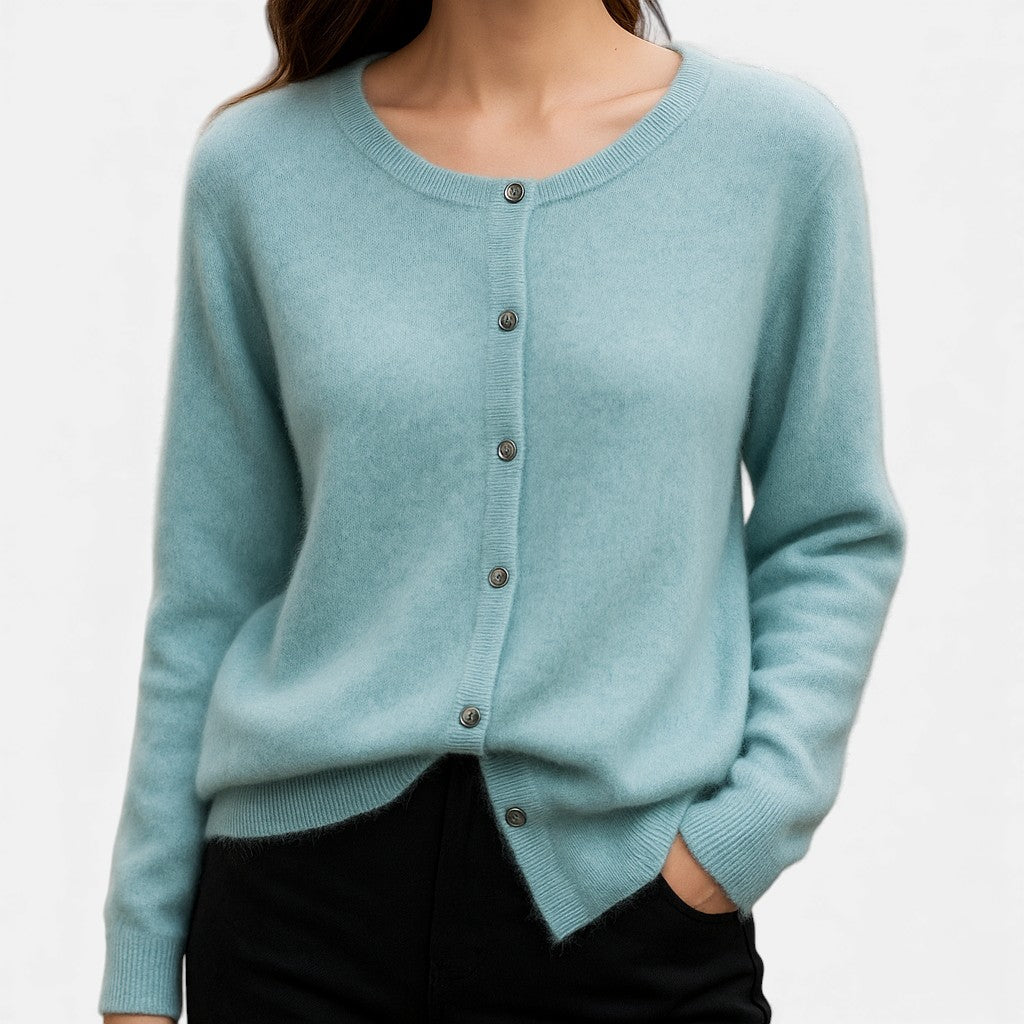 Elegant Christine Brewer Stella cashmere button-front women's sweater displayed on a model, showcasing soft knit fabric and classic design.