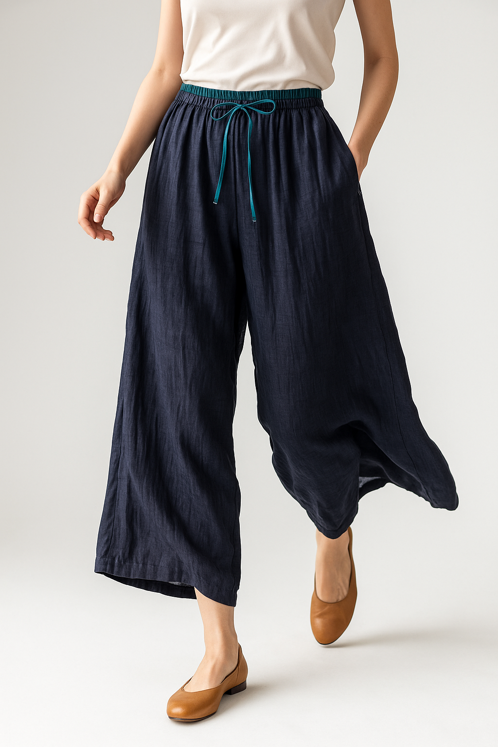 Women’s tapered linen trousers by Christine Brewer, loose pull-on pants, lightweight and elegant for casual or dressy wear.
