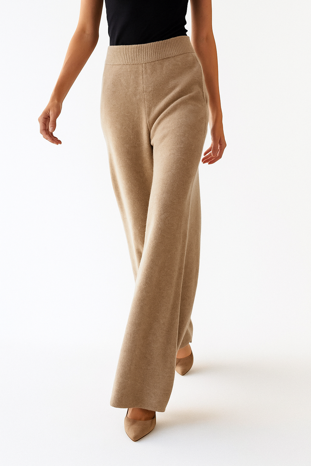 Women’s loose pull-on joggers by Christine Brewer, casual pants with a relaxed fit and comfortable style, shown swaying in the breeze.