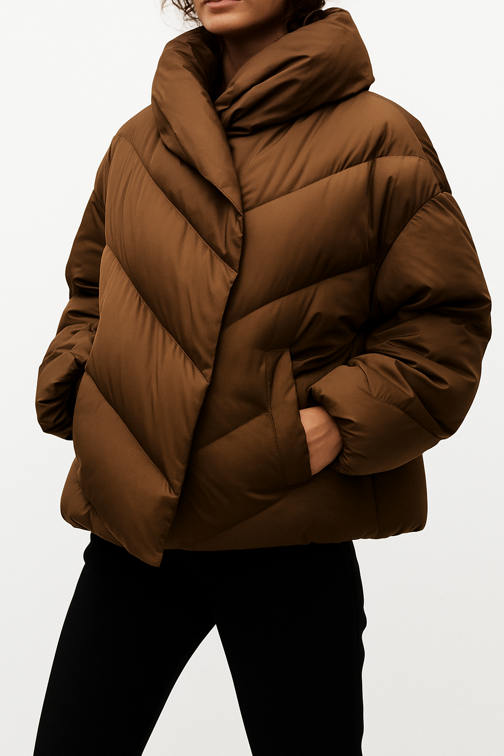 Brown cropped hooded puffer jacket for women by Christine Brewer, featuring a stylish padded design and hooded collar.