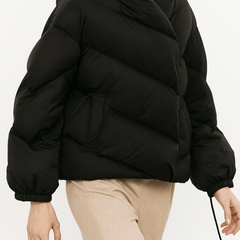 Women's cropped hooded puffer jacket by Christine Brewer, stylish high-end puffer with a hood and quilted design.