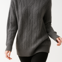 Cashmere cable knit sweater for women by Christine Brewer, featuring a cozy, elegant design in a neutral tone.