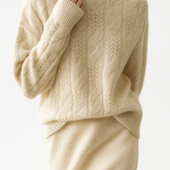 Cashmere cable knit sweater for women by Christine Brewer, featuring a cozy, textured design and classic fit.