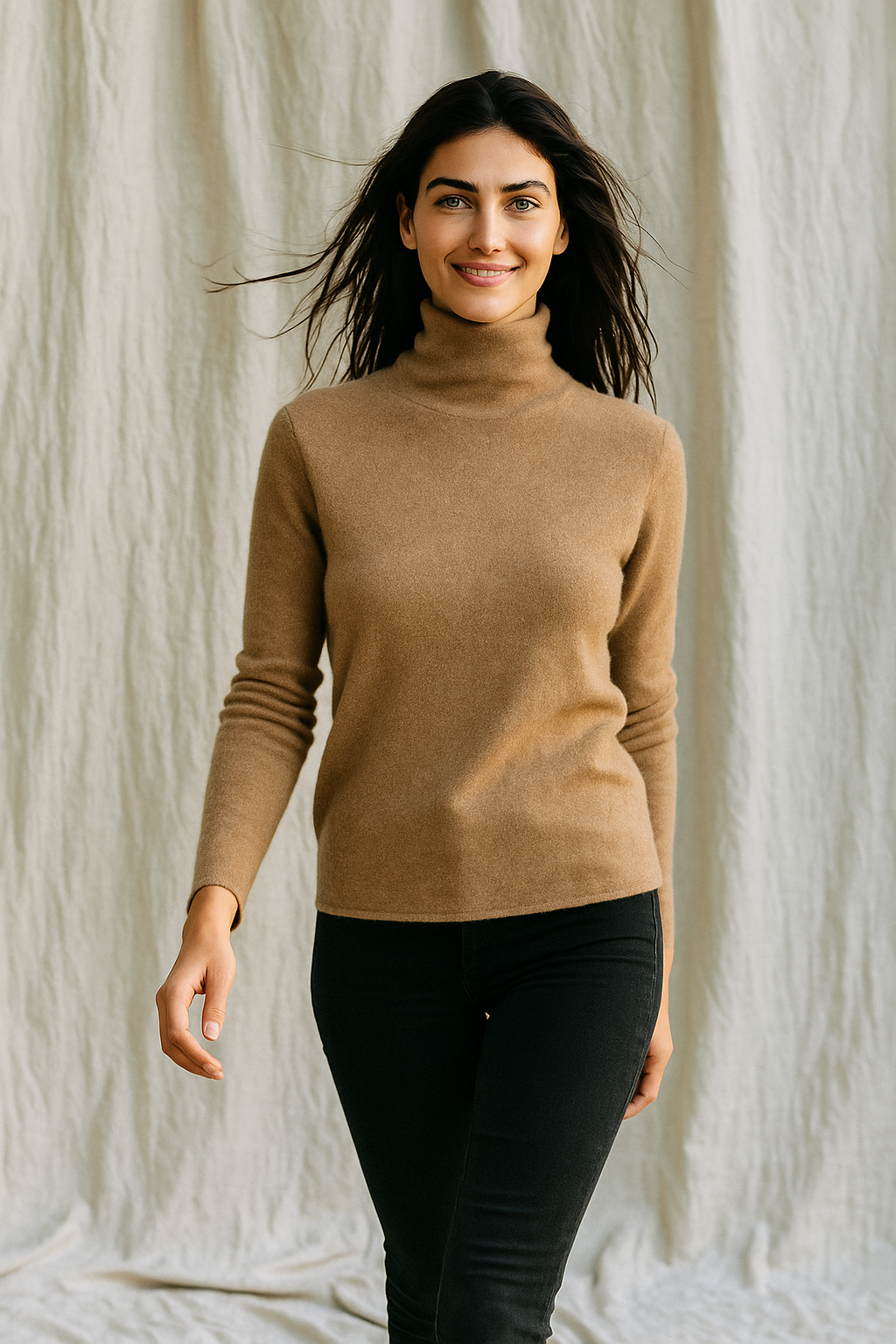 Women’s cashmere turtleneck sweater from Christine Brewer, featuring a cozy, elegant design in a neutral color.