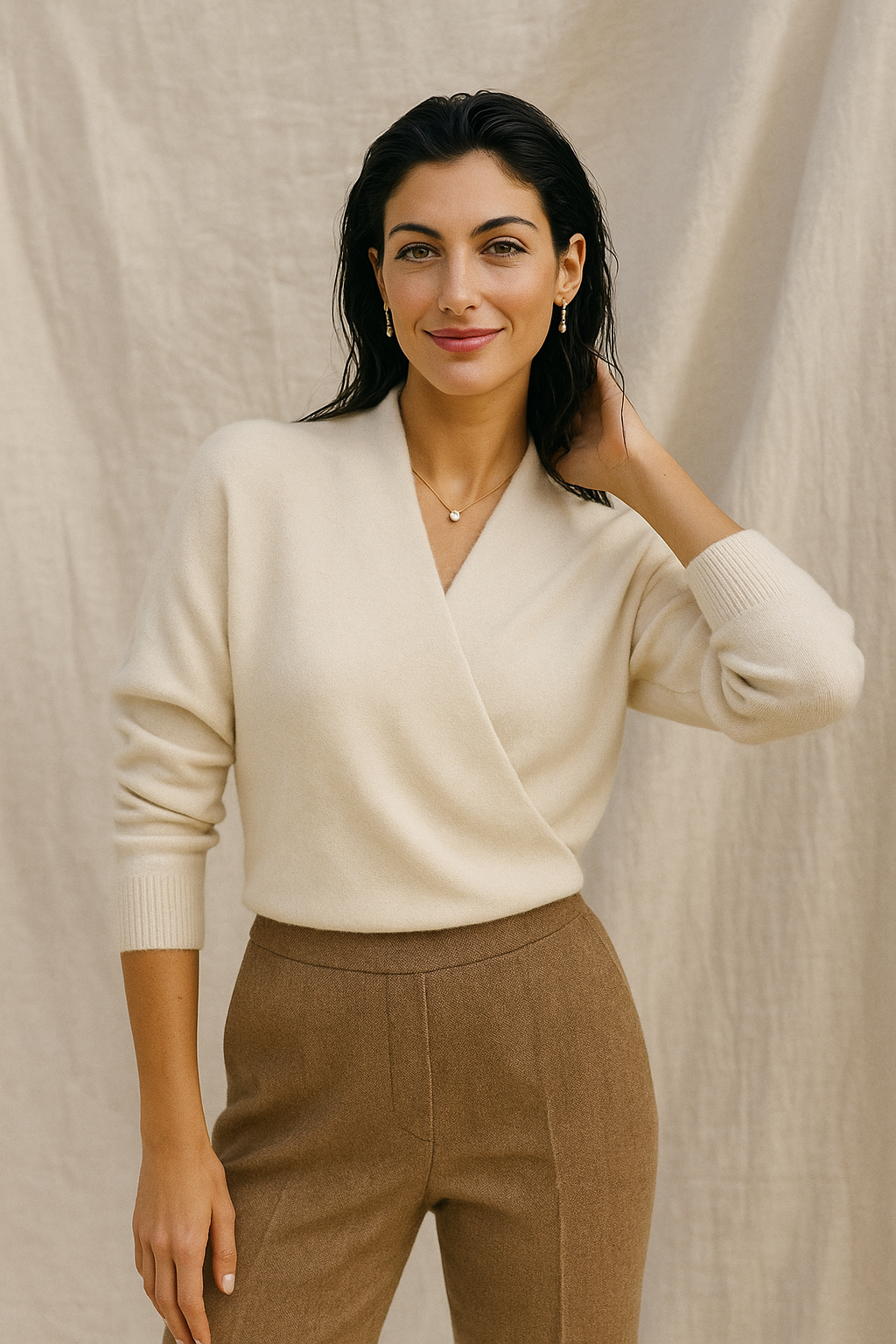 Elegant Gwen cashmere V-neck sweater for women by Christine Brewer, displayed in a stylish, fitted silhouette.