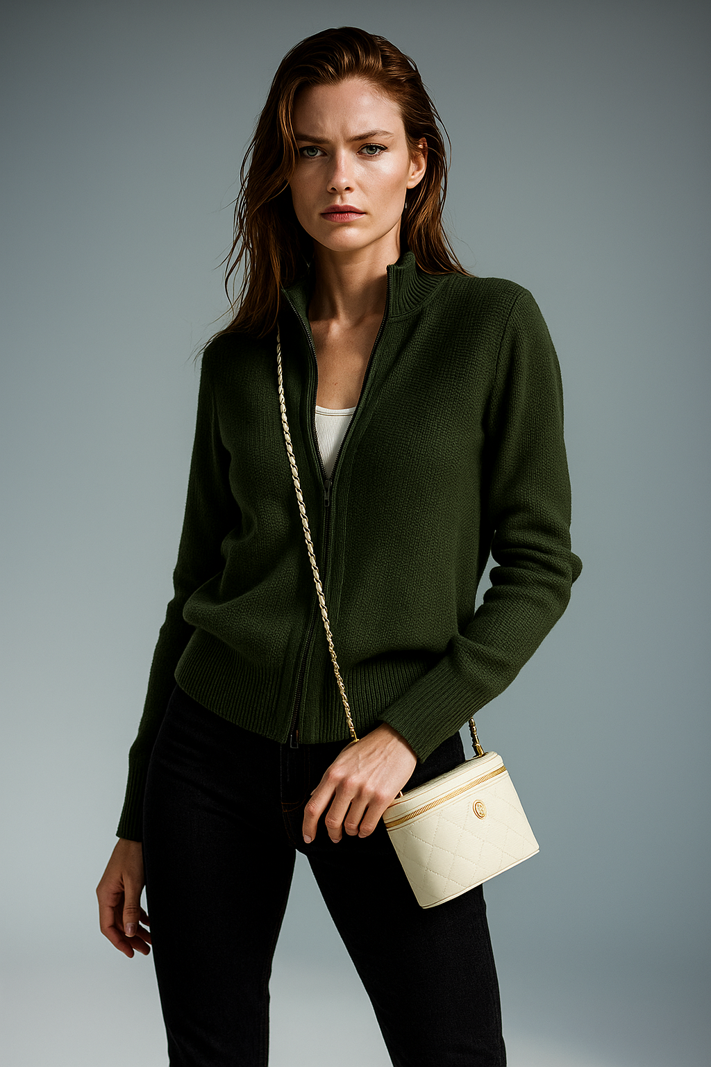 Elegant wool zip-up cardigan for women by Christine Brewer, shown in a stylish pose with a soft, cozy texture.