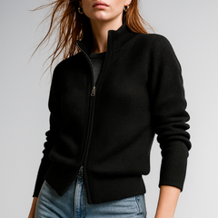 Women’s wool zip-up cardigan by Christine Brewer featuring a classic jean style and front zipper detail.