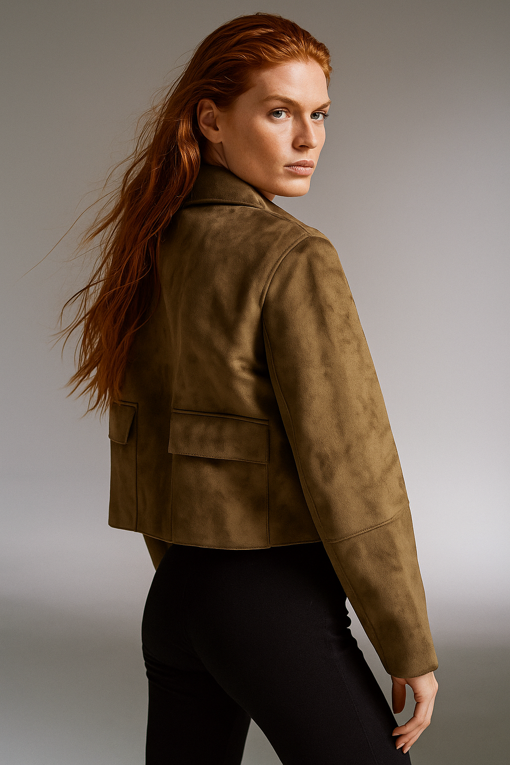 Faux suede cropped women's jacket in hazel color by Christine Brewer, displayed on a hanger with a neutral background.
