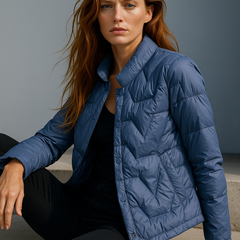 Blue Aurora quilted puffer jacket for women by Christine Brewer, short style with quilted design and puffy insulation.