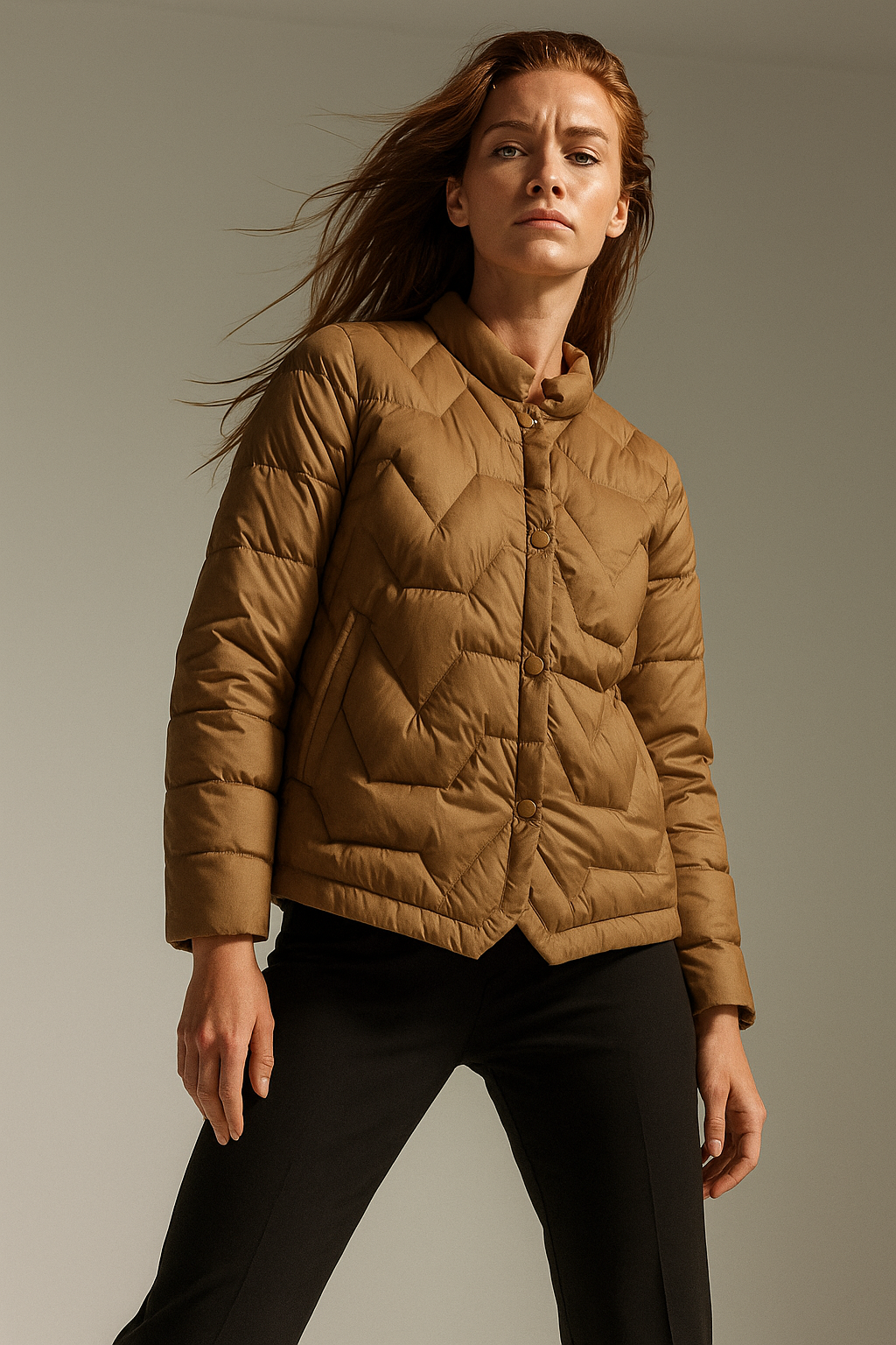 Brown Aurora quilted puffer jacket for women by Christine Brewer, showcasing its short, padded design and quilted texture.