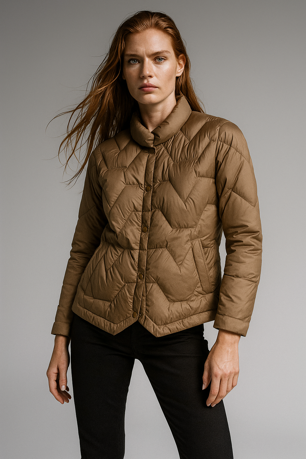 Brown Aurora quilted puffer jacket for women by Christine Brewer, featuring short, insulated design and quilted pattern.