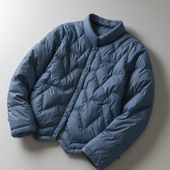Elegant short quilted puffer jacket for women by Christine Brewer, showcasing a sleek, stylish design with a quilted pattern.