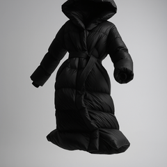 Black Ella long belted puffer jacket for women by Christine Brewer, featuring a hood and waist belt, displayed on a mannequin.