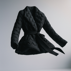 Black belted quilted puffer jacket for women by Christine Brewer, featuring a stylish quilted design and belt at the waist.