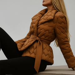 Brown Chloe belted quilted puffer jacket for women, styled with a belt, displayed on a mannequin.