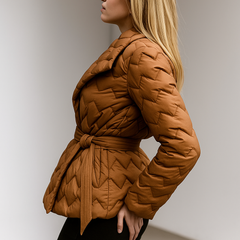 Brown Chloe belted quilted puffer jacket for women by Christine Brewer, featuring a stylish quilted design and waist belt.