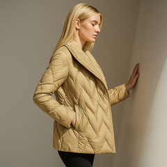 Christine Brewer Chloe belted quilted puffer jacket for women, stylish insulated winter coat with quilted design and belt detail.