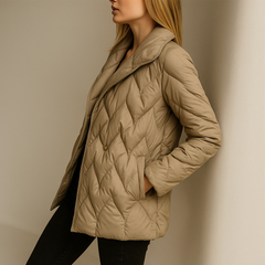 Christine Brewer Chloe belted quilted puffer jacket for women, stylish winter outerwear with a quilted design and waist belt.