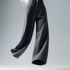 Elegant gray tailored wide-leg trousers for women by Christine Brewer, shown on a model with a relaxed fit and high waist.