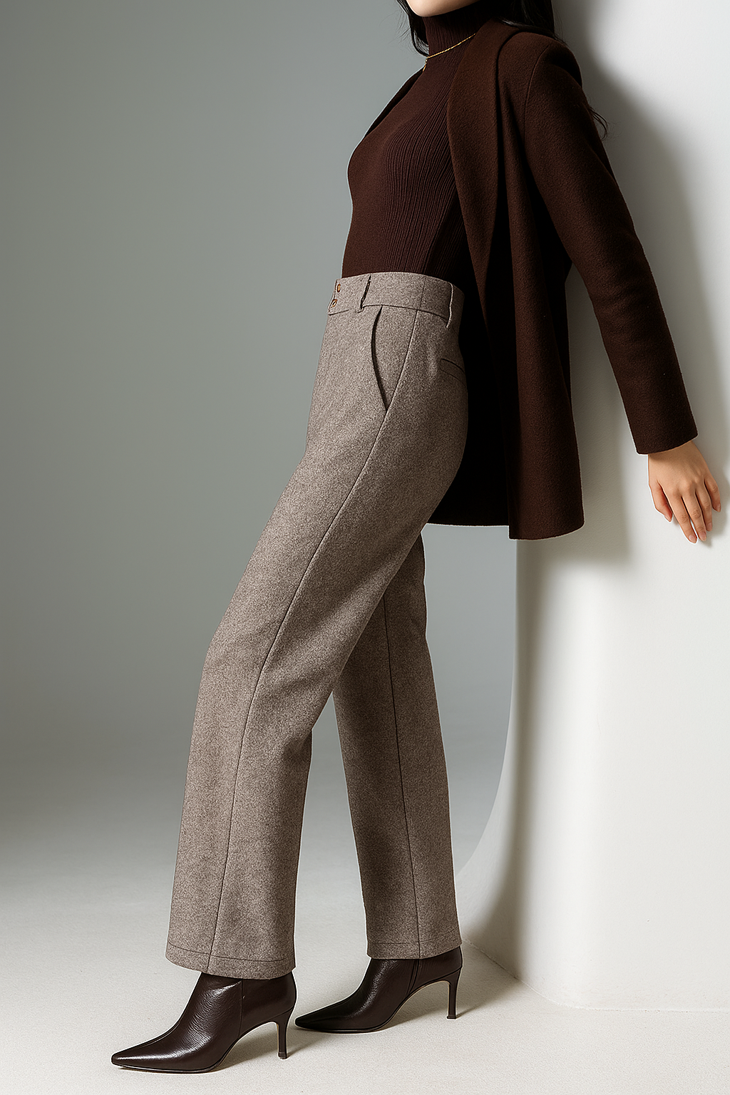 Stylish beige wide-leg trousers for women by Christine Brewer, tailored fit, featuring a high waist and flowing silhouette.